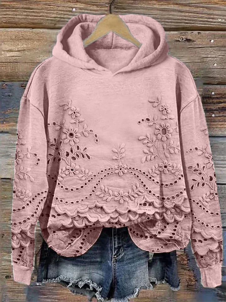 Dārta Floral Hoodie – sieviešu kapuces džemperis ar izsmalcinātu ziedu izšuvumu