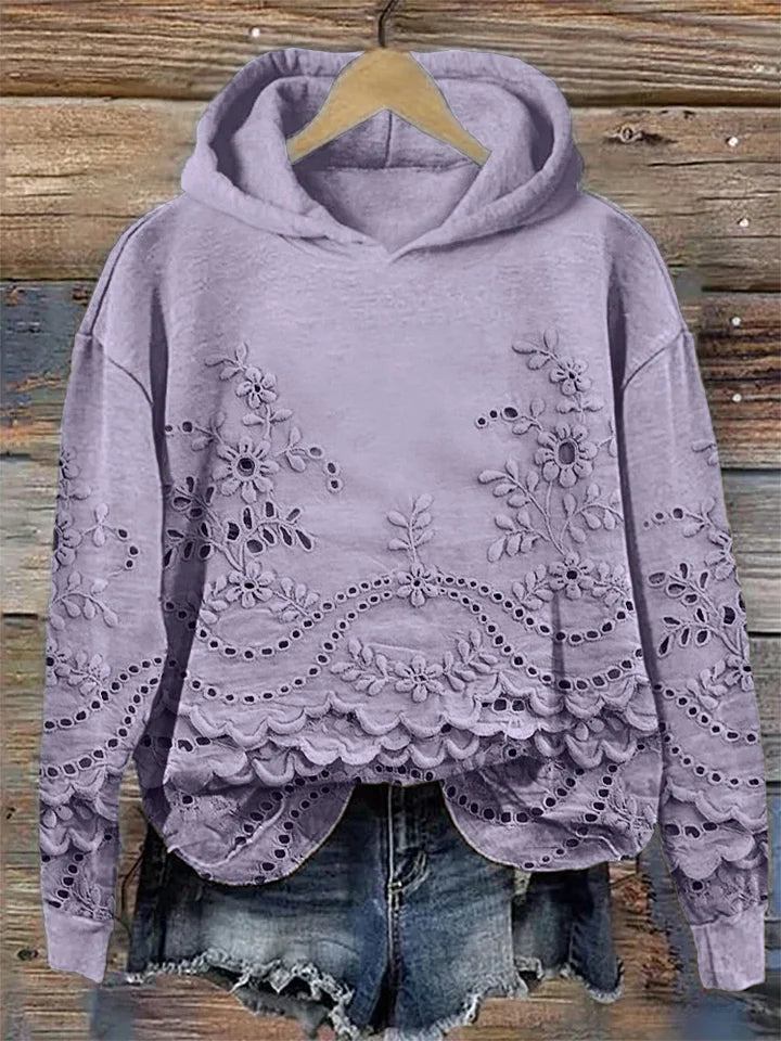Dārta Floral Hoodie – sieviešu kapuces džemperis ar izsmalcinātu ziedu izšuvumu