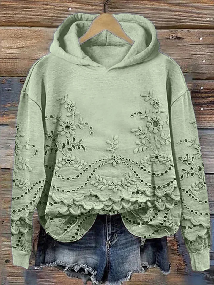 Dārta Floral Hoodie – sieviešu kapuces džemperis ar izsmalcinātu ziedu izšuvumu
